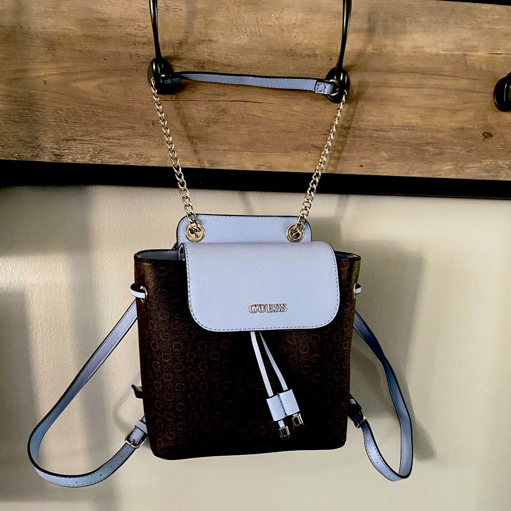 Guess backpack purse. New with Tags unattached. Baby blue & brown.